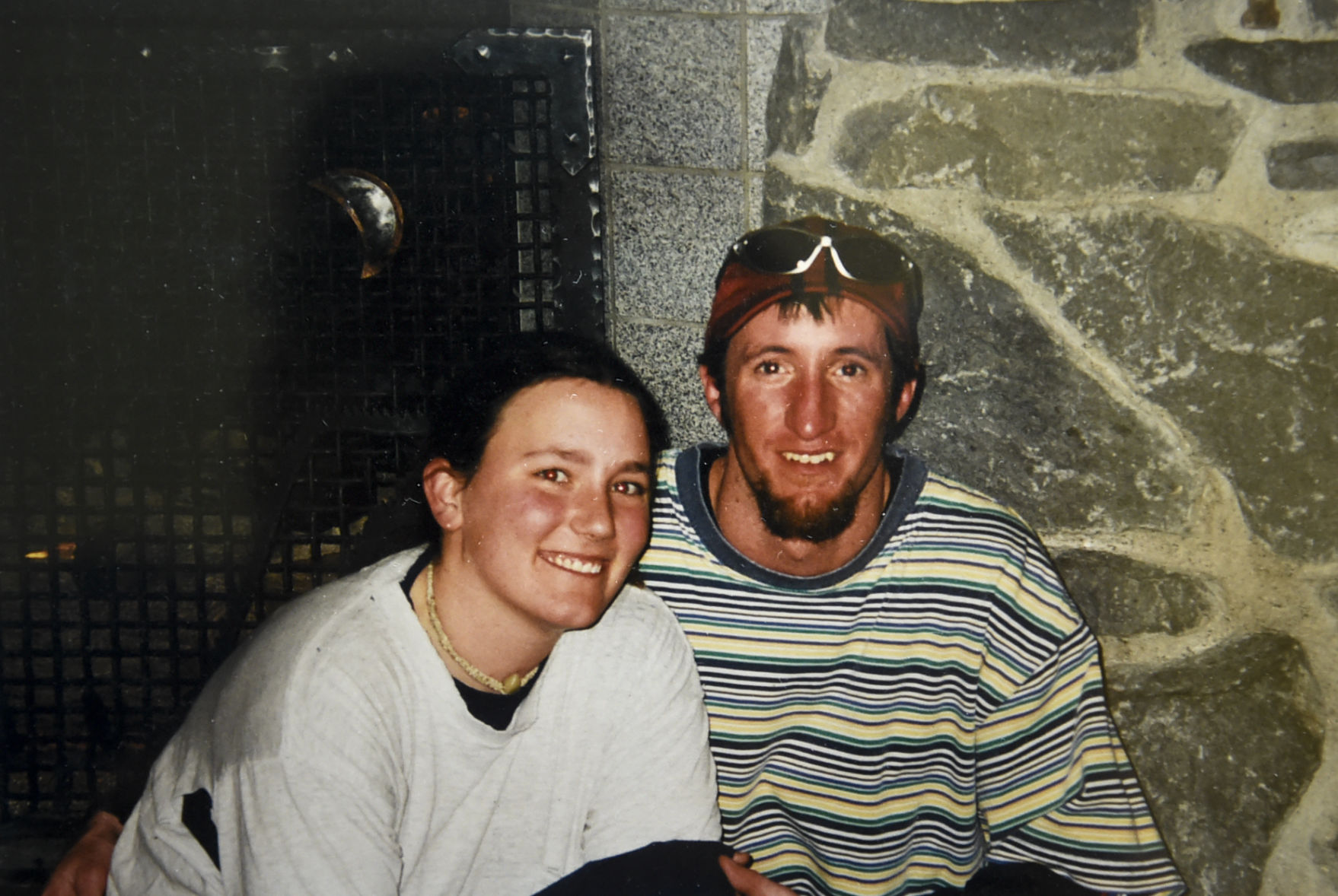 Linda wrapped in the arm of Patty Glantz, the man she would later marry, at Yellowstone National Park in 2000